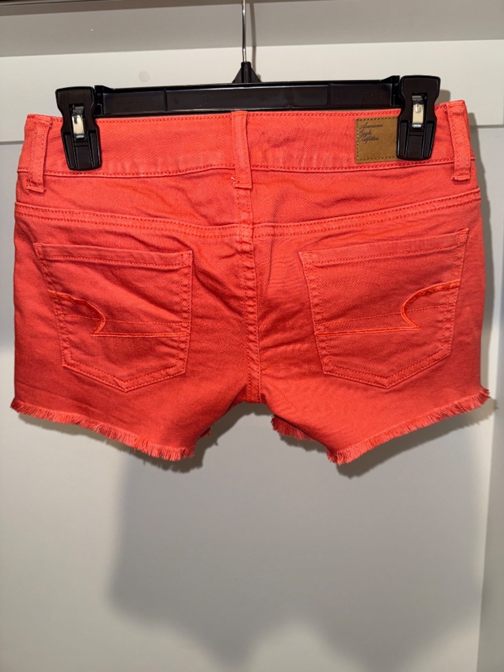 Vintage American Eagle Orange/Coral Stretch Denim Cutoff Shorts Size 00